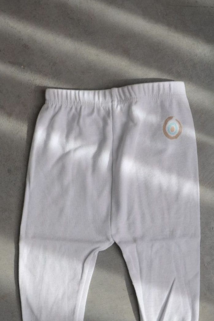 מכנסי רגלית NEWBORN עין חול עגולה