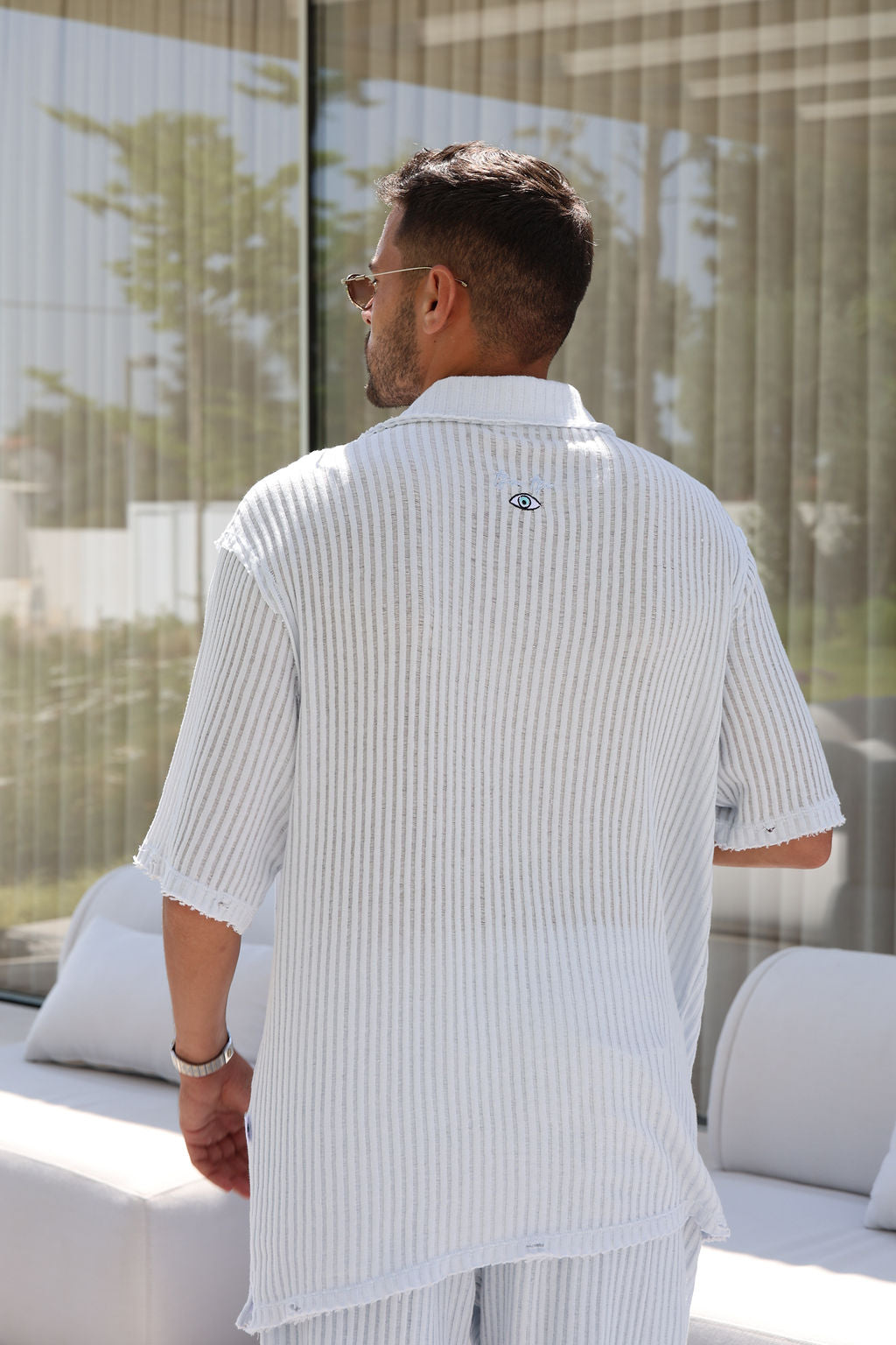 מכופתרת סריג פסים תכלת